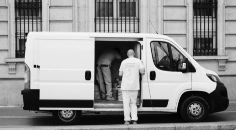 a man standing next to a van